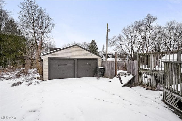 view of snow covered garage