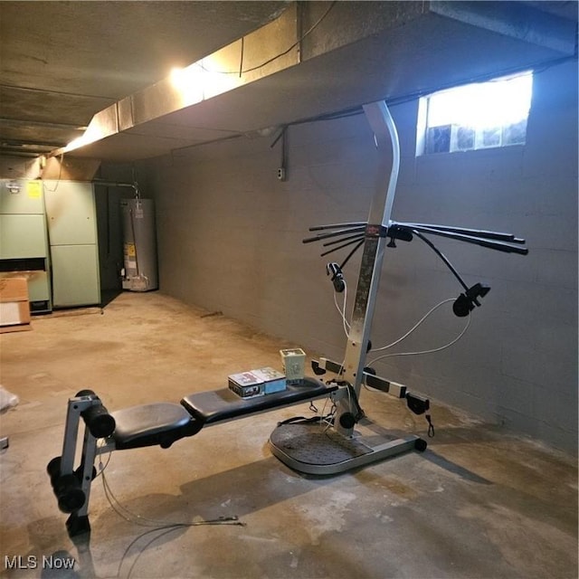 exercise room featuring gas water heater