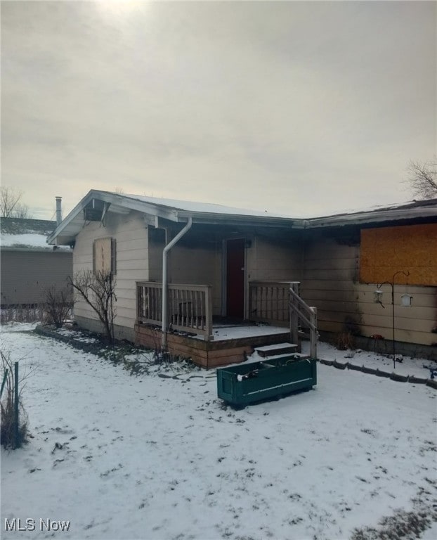 view of snow covered property