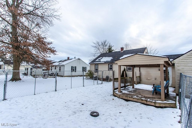 view of snow covered house