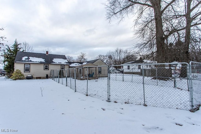 view of yard covered in snow