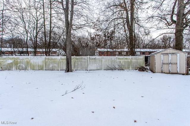 view of yard covered in snow