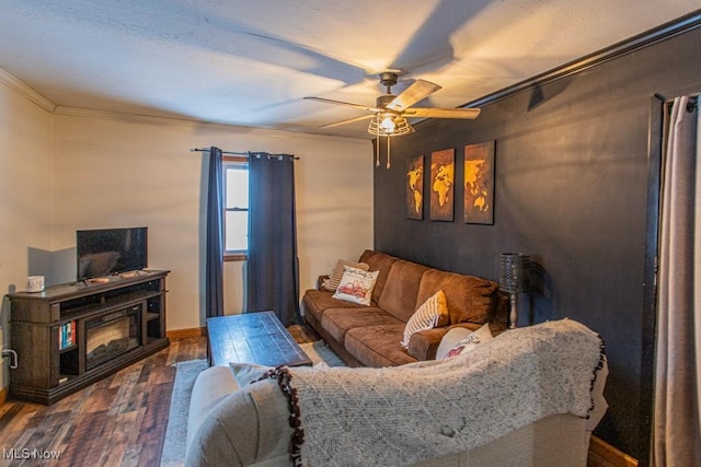 living room featuring crown molding, ceiling fan, and hardwood / wood-style floors