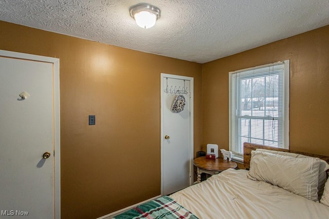 bedroom with a textured ceiling