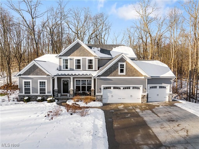 craftsman-style home with a garage