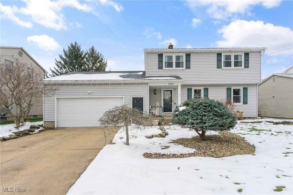 view of property featuring a garage