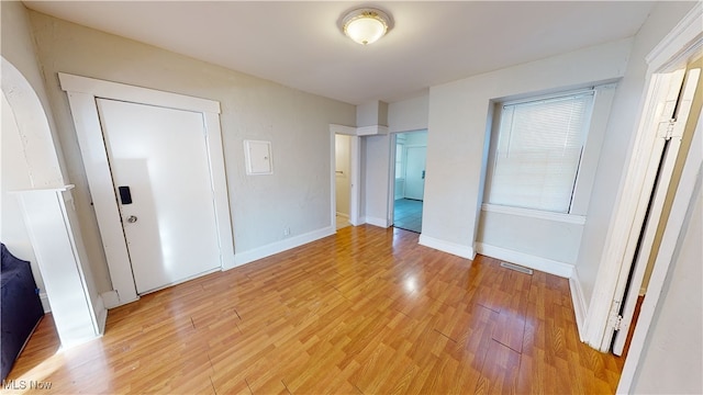 unfurnished bedroom featuring light hardwood / wood-style floors