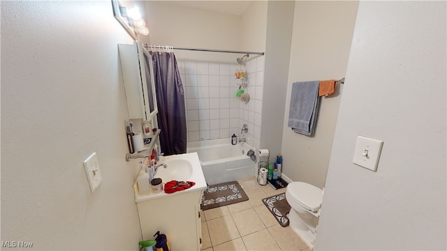 full bathroom with tile patterned flooring, vanity, toilet, and shower / bath combo with shower curtain