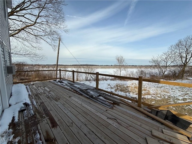 view of snow covered deck