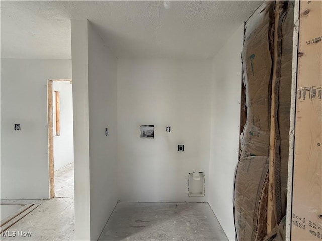 laundry area with washer hookup, hookup for an electric dryer, and a textured ceiling