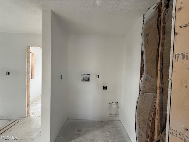 laundry area with washer hookup, hookup for an electric dryer, and a textured ceiling