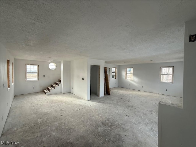 interior space featuring a textured ceiling