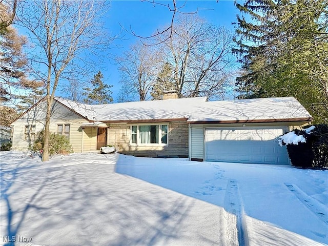 single story home featuring a garage