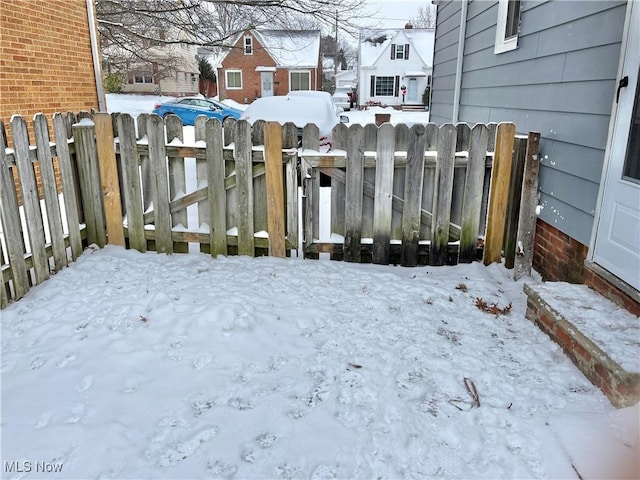 view of yard covered in snow