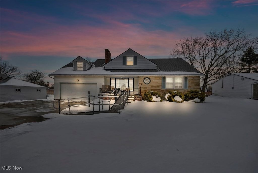 view of front of property with a garage