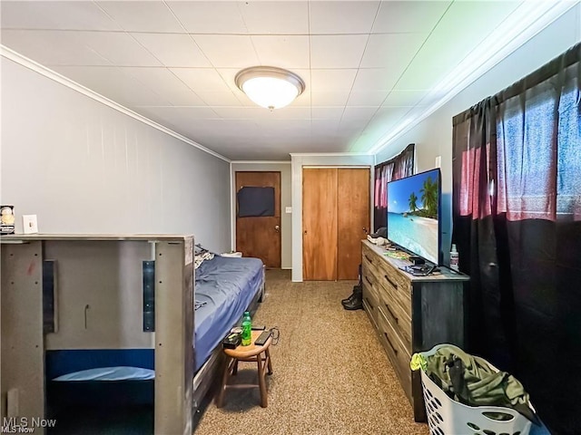 carpeted bedroom with crown molding