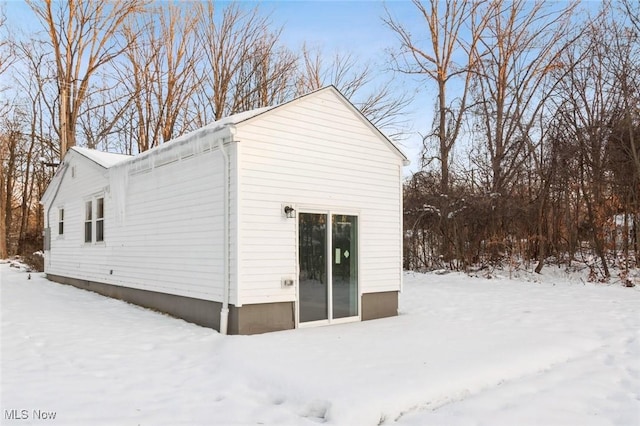 view of snow covered property