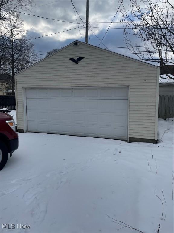 view of snow covered garage