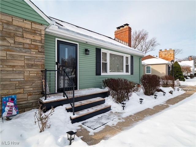 view of snow covered property