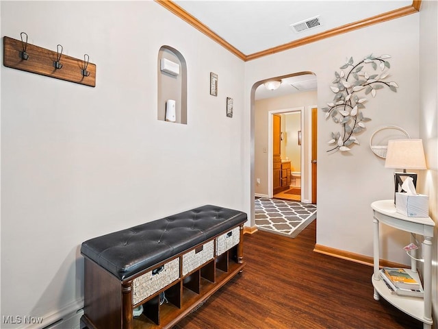 hallway with ornamental molding and dark hardwood / wood-style floors