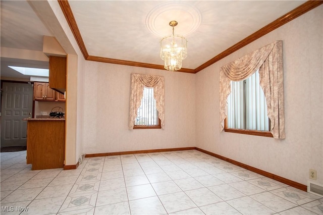 unfurnished room with ornamental molding and a chandelier