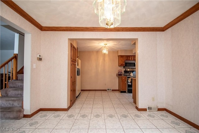 interior space with an inviting chandelier, ornamental molding, range with electric cooktop, and light tile patterned flooring