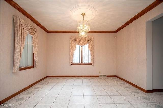 spare room with a notable chandelier, crown molding, and tile patterned floors