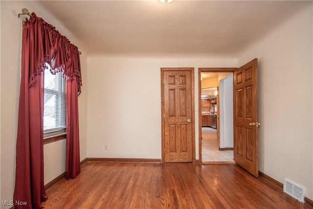 empty room featuring light hardwood / wood-style floors