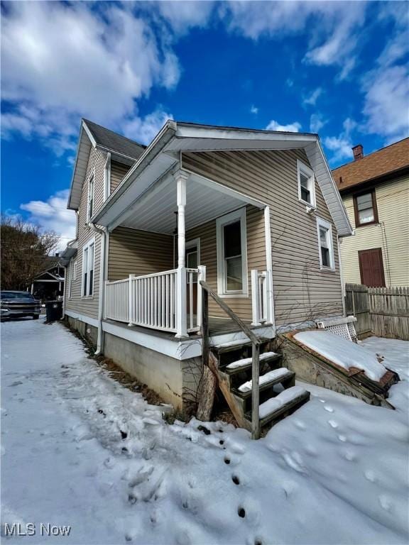 view of front of home featuring covered porch