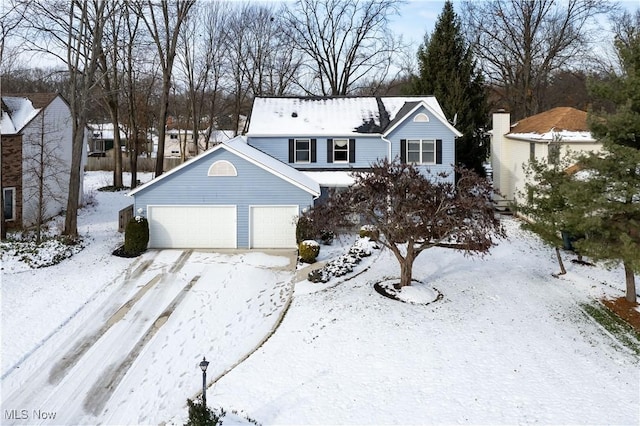 front of property featuring a garage