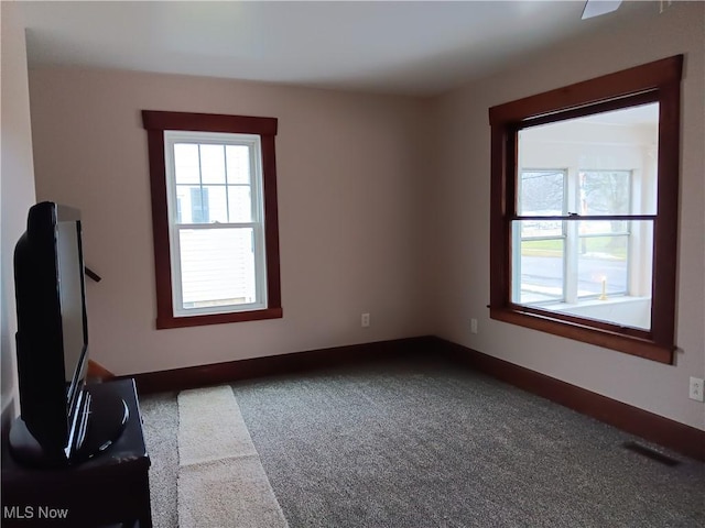 empty room with carpet flooring