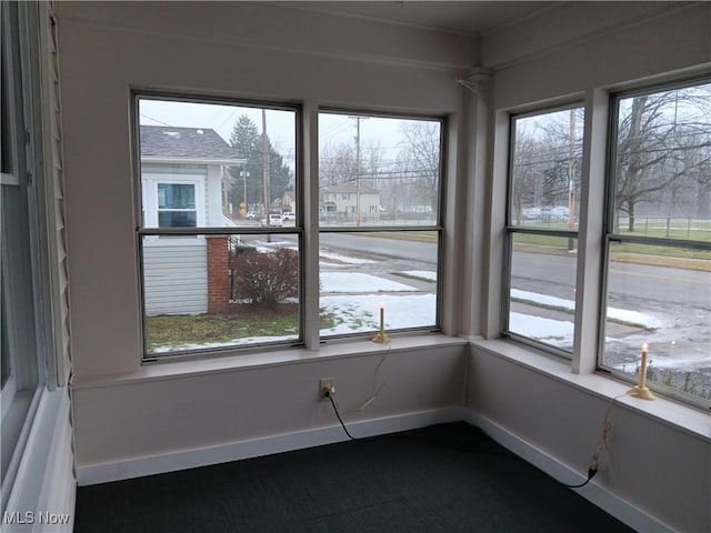 view of unfurnished sunroom