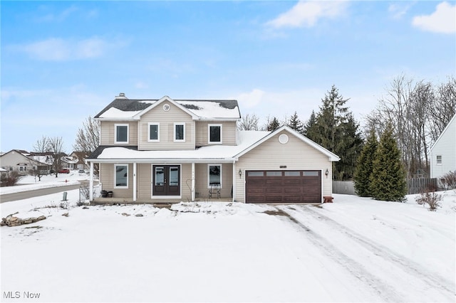 view of front of property with a garage