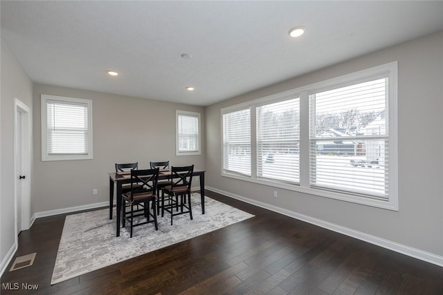 dining room featuring dark hardwood / wood-style floors