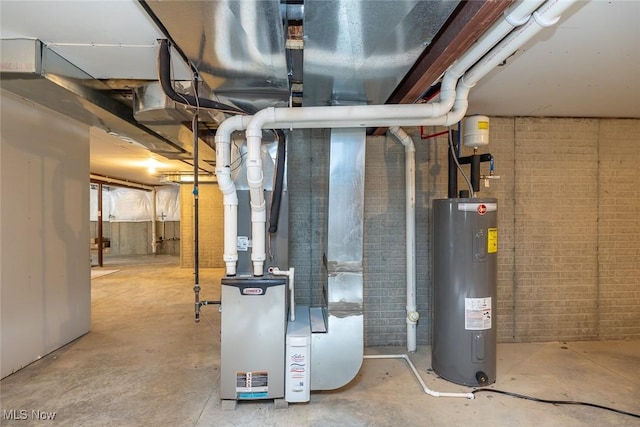 utility room with heating unit and electric water heater