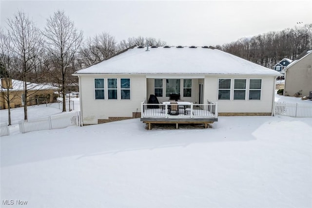 view of snow covered house