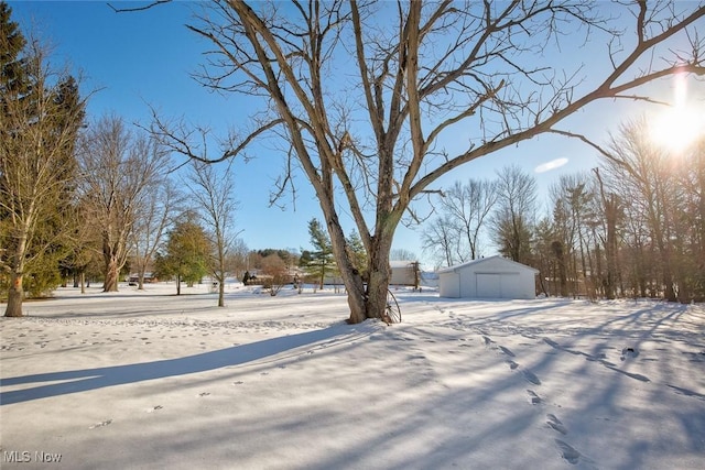 view of yard layered in snow