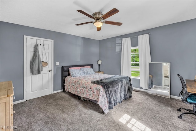 carpeted bedroom featuring ceiling fan