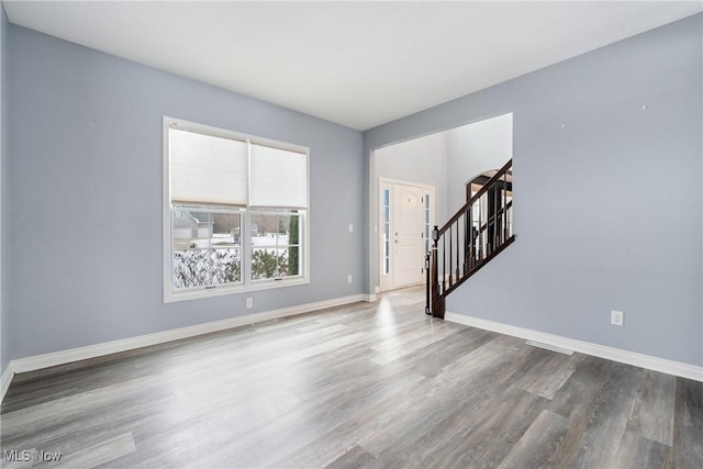 interior space with hardwood / wood-style floors