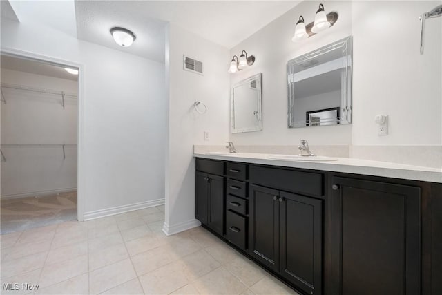 bathroom featuring vanity and tile patterned floors