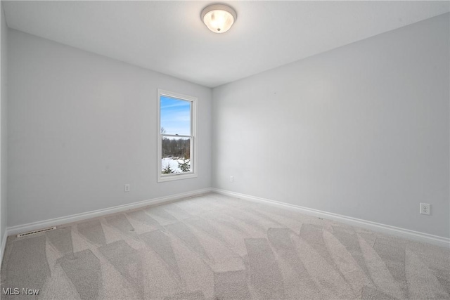 view of carpeted spare room