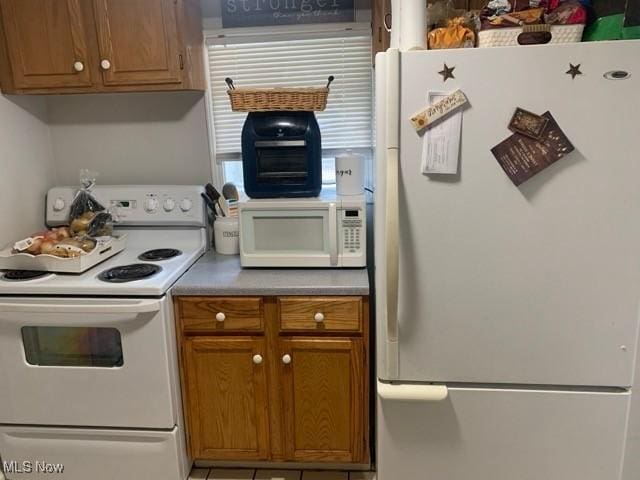 kitchen featuring white appliances