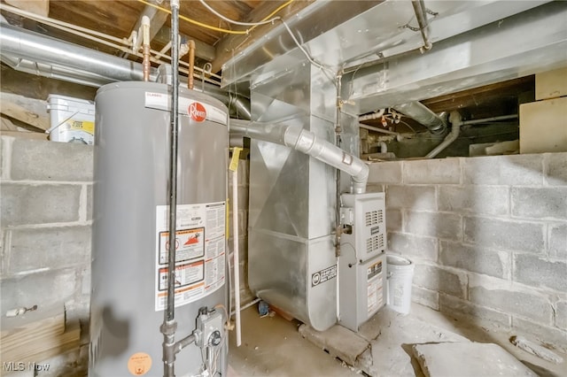 utility room with heating unit and gas water heater