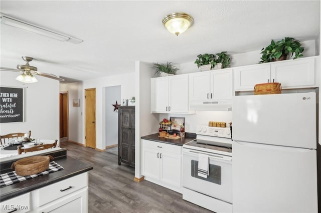 kitchen with ceiling fan, white appliances, dark wood-type flooring, and white cabinets