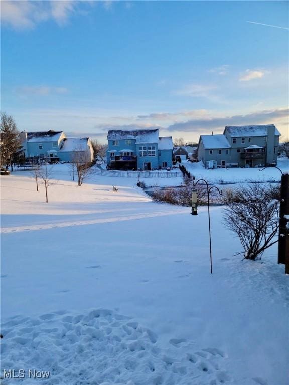 view of snowy yard