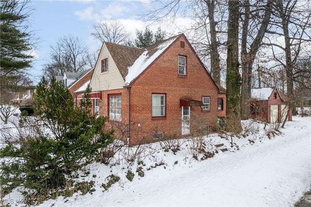 view of snow covered property