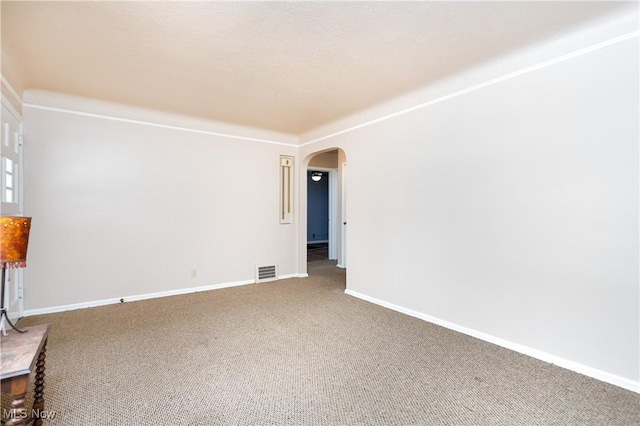 empty room featuring carpet flooring