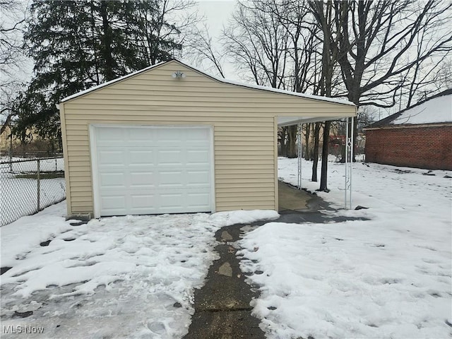 view of snow covered garage