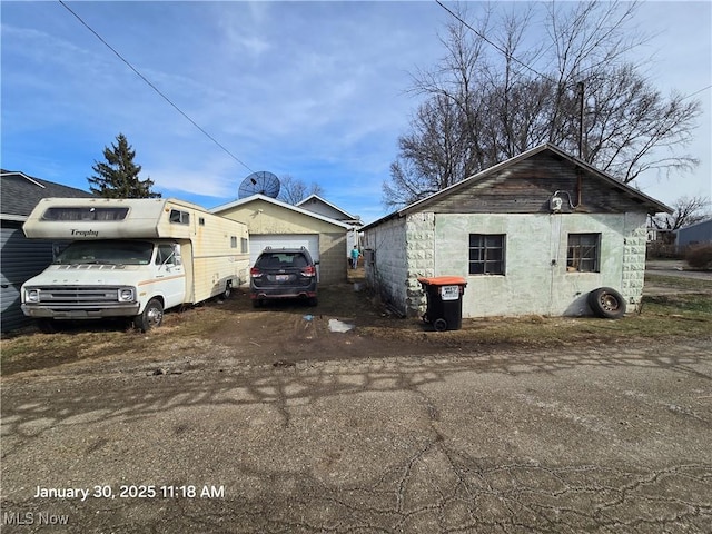 view of home's exterior with a garage