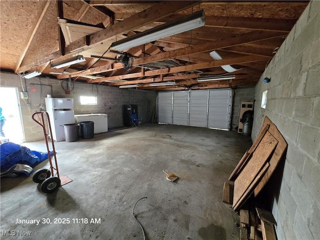 garage featuring white refrigerator